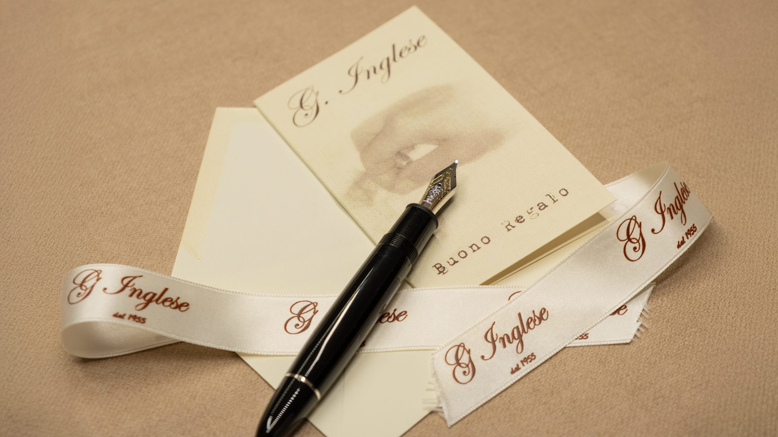 G. Inglese Gift Card with a pen and the tape